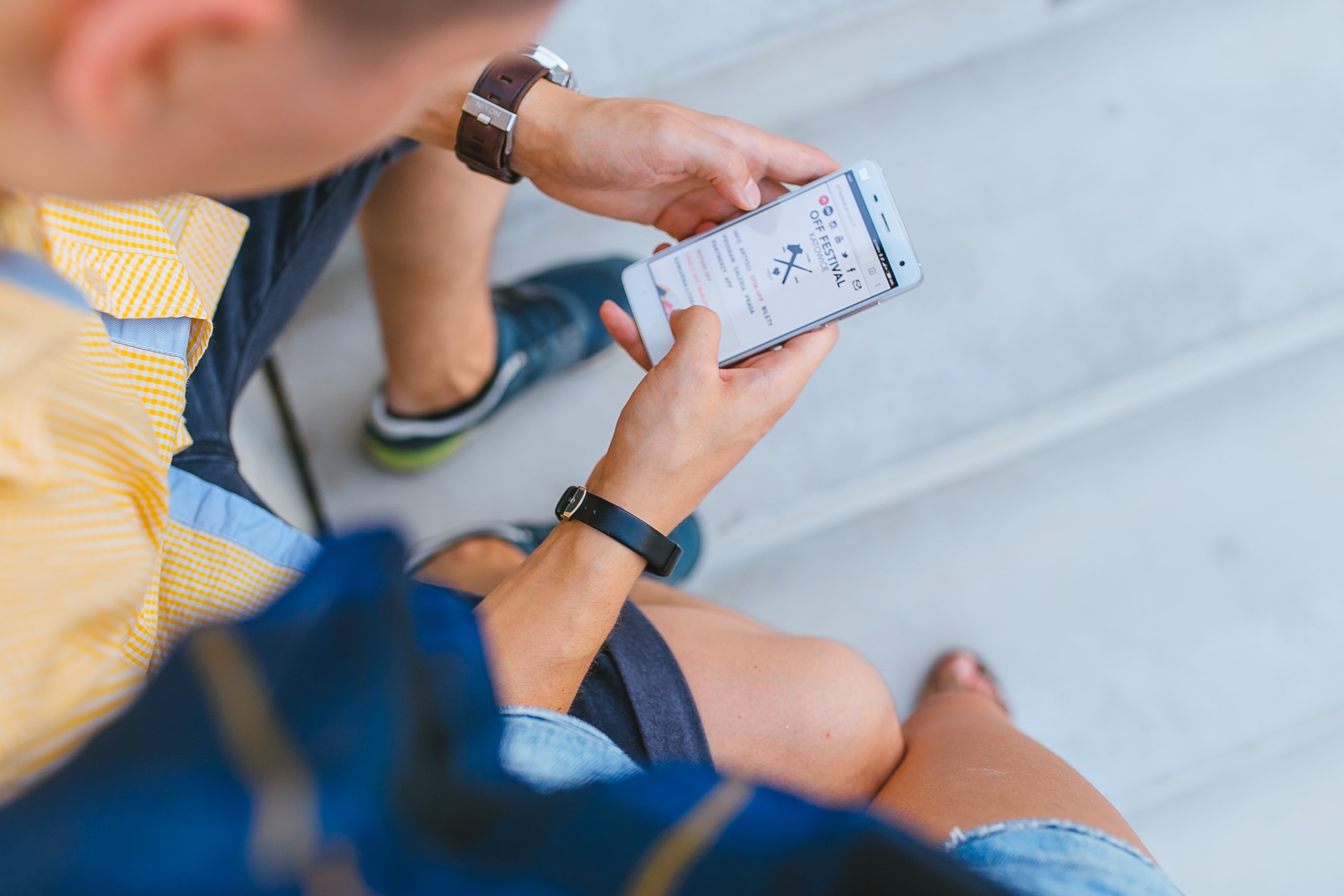 Man receiving a notification on a phone